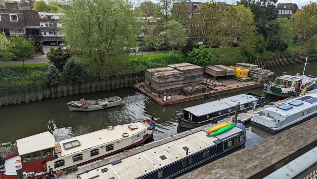 Small boat towing barge