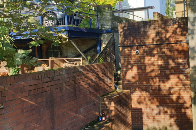 The wall view from the riverside path